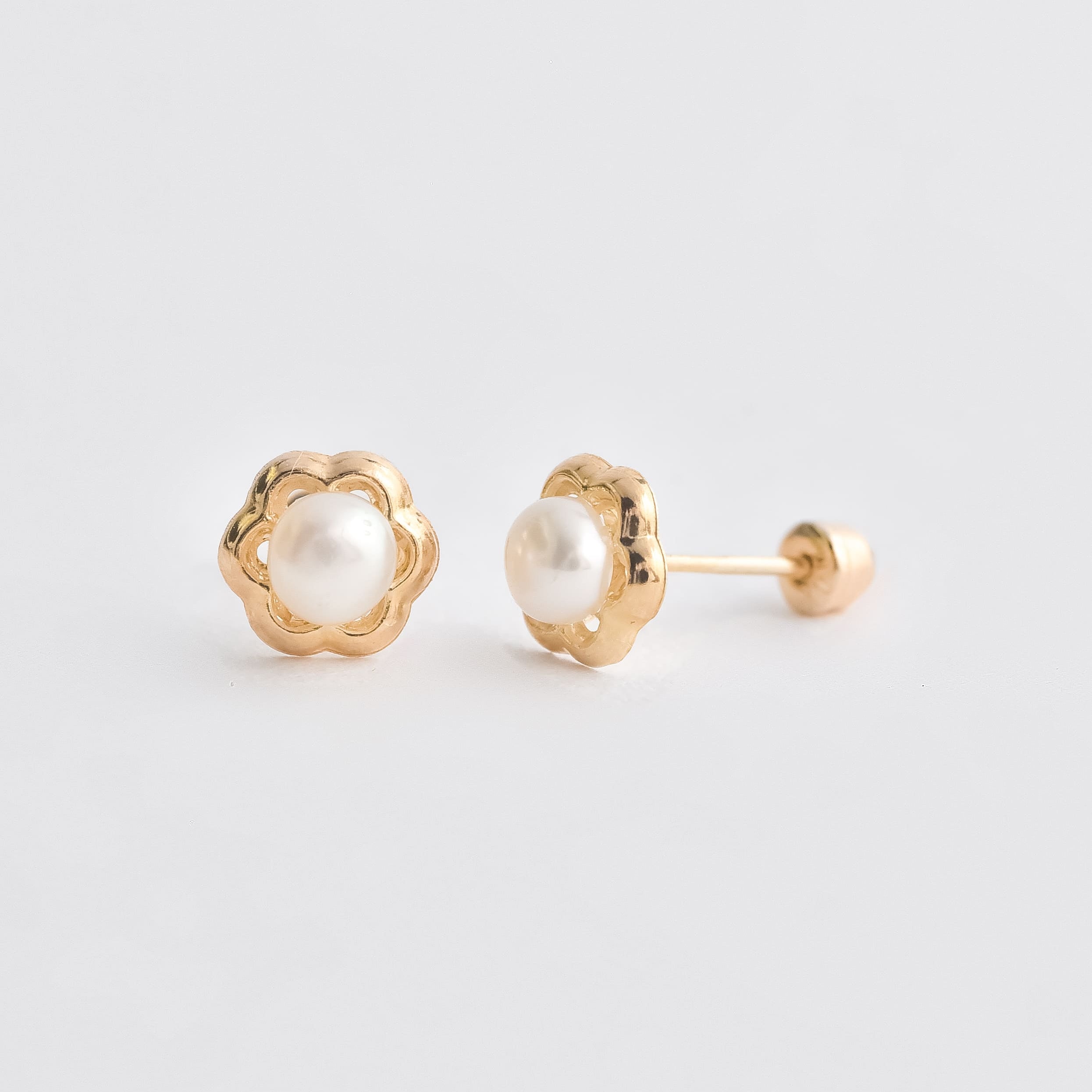 BROQUEL DE FLOR CON PERLA